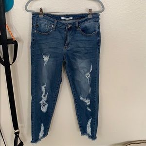 Blue jeans with rips